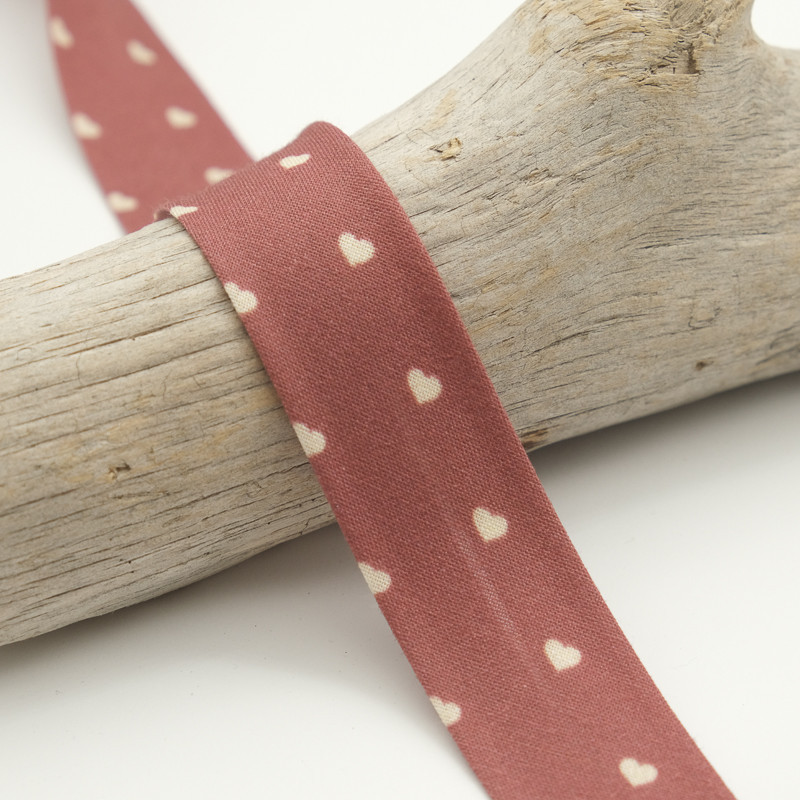 25mm Printed Bias Tape with Ecru Hearts on a Brick-Red Background - Maison Klem